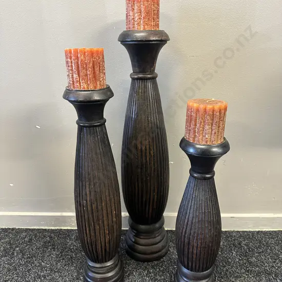 Set Of Three Wooden Candle Holders & Rust Coloured Candles Graduated Sizes 48-68cm.