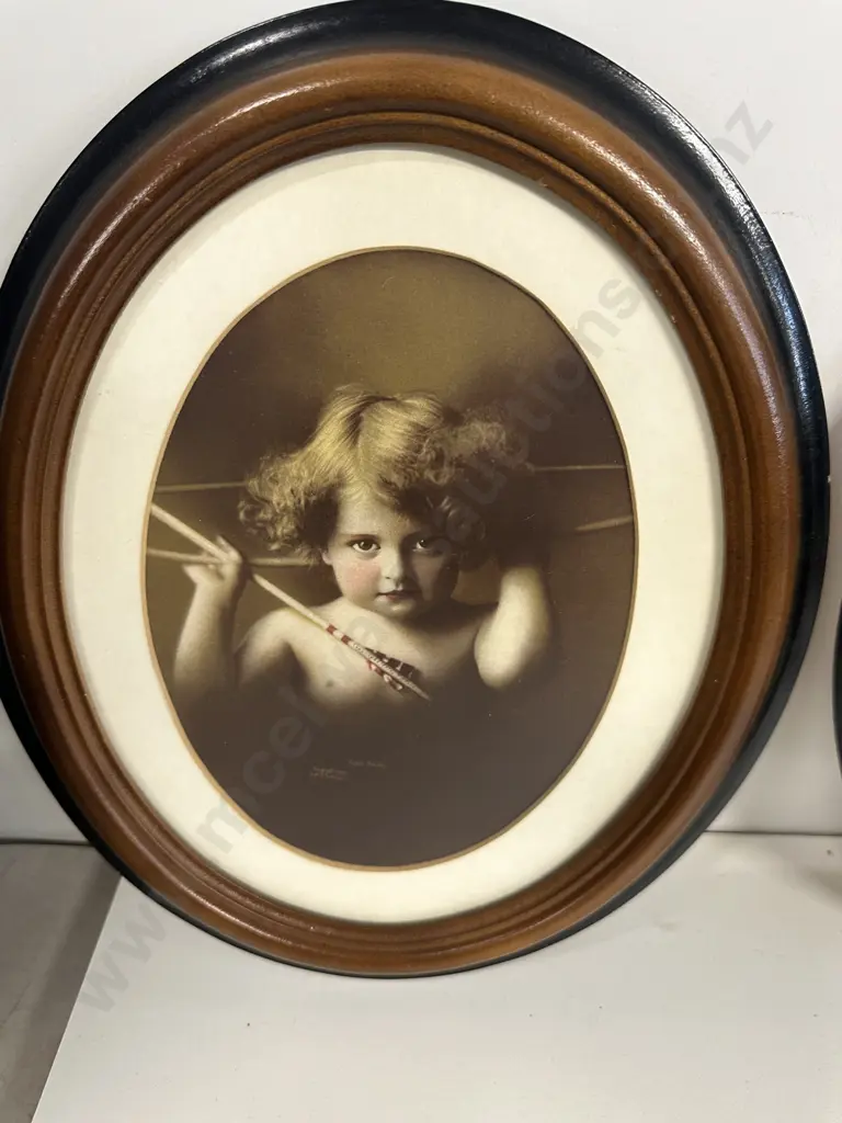 Pair Of Vintage Oval mahogany Framed Prints 'Cupid Asleep' & 'Cupid Awake' Image 1++