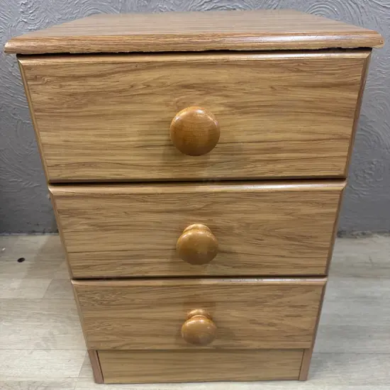 Furnells Furniture Rimu Effect Three Drawer Bedside Cabinet H61 W40 D40cm.