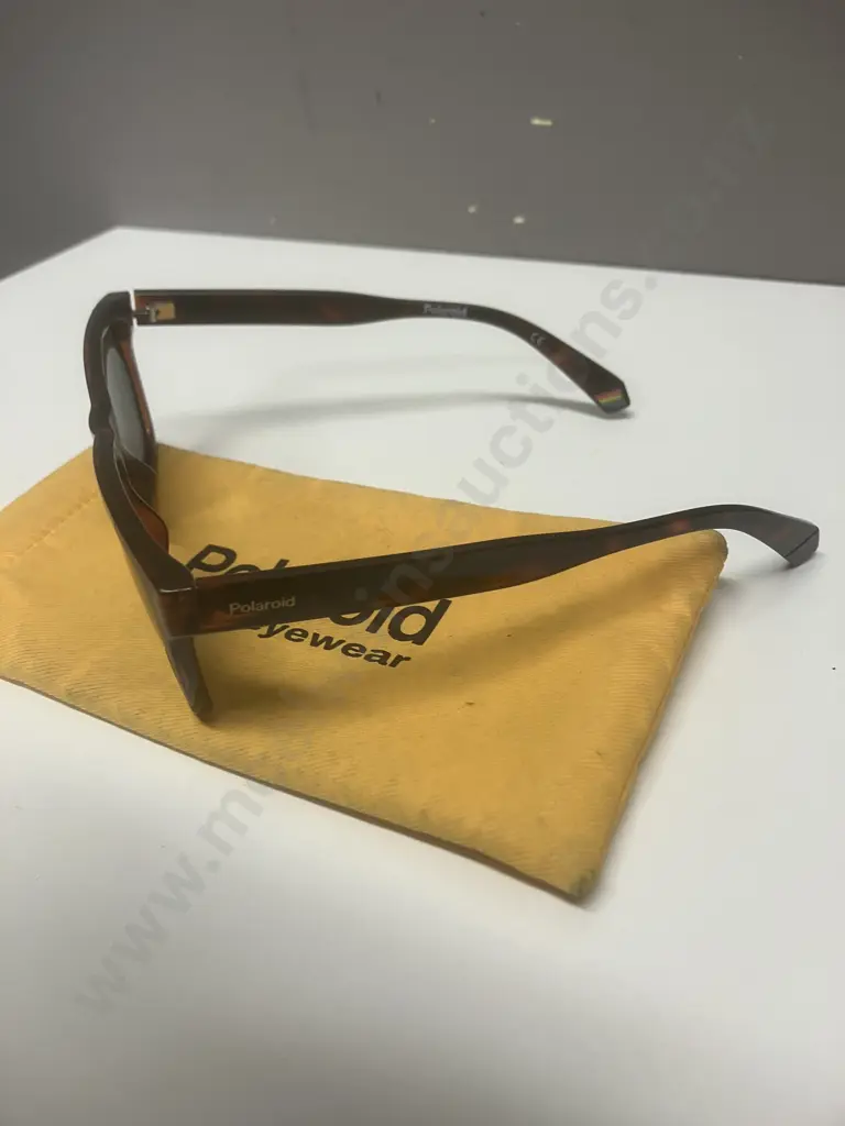 Polaroid Sunglasses With Yellow Case Image 1++