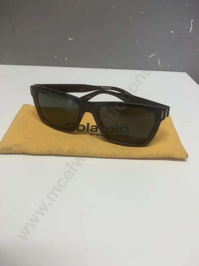 Polaroid Sunglasses With Yellow Case Image 1++
