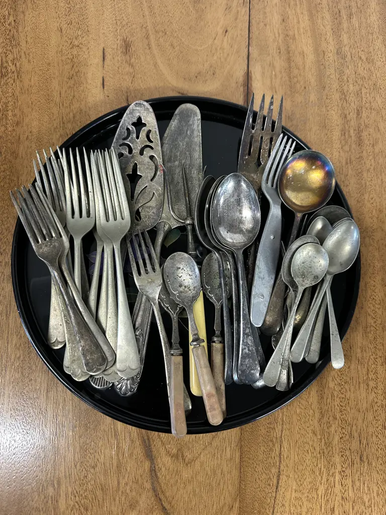 Selection Of Silverware Cutlery Items On Oriental Serving Tray Image 1++