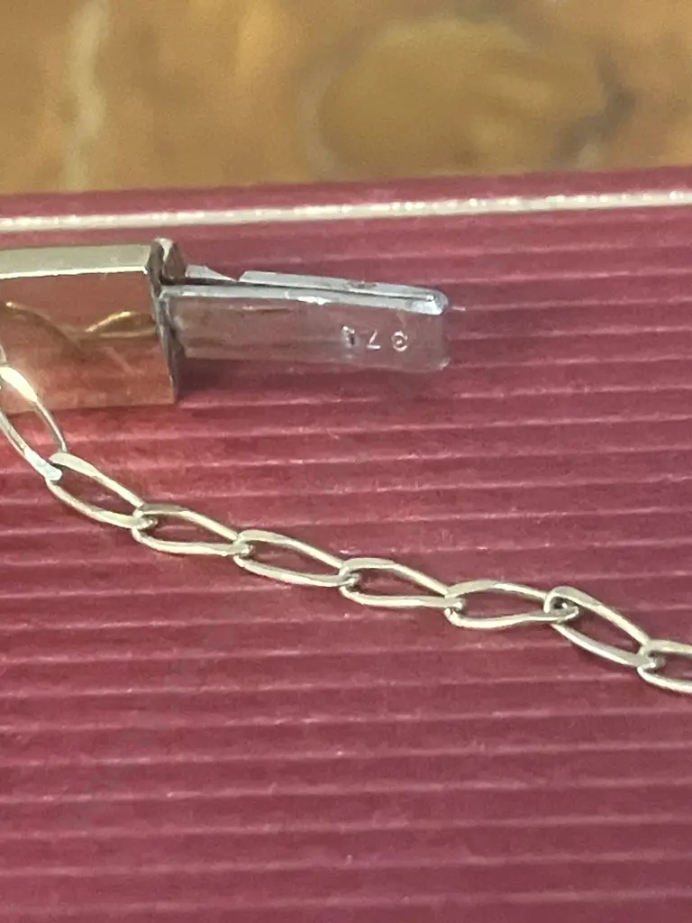 Stamped 375 Gold Hinged 'Bark Pattern' Bangle With Safety Chain Image 1++