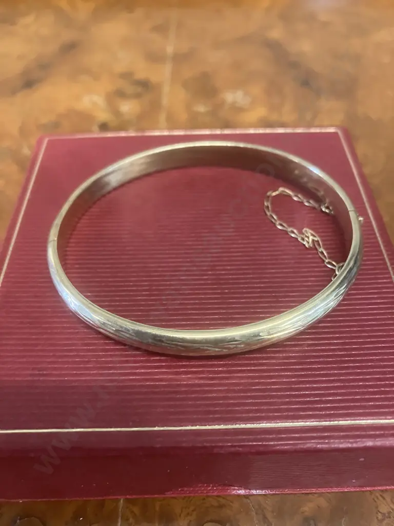 Stamped 375 Gold Hinged 'Bark Pattern' Bangle With Safety Chain Image 1++