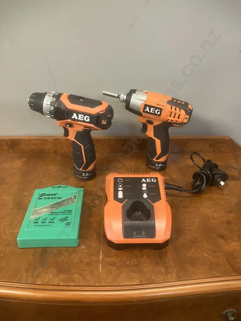 AEG 12V Ultra Compact 2-Speed Drill/Driver, Impact Driver, 2 x 2.0Ah Batteries, Charger & Evacut Drill Bits Image 1++