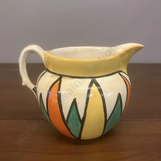 A Clarice Cliff 'Original Bizarre' Jug Early 1930's - Newport Pottery England. H9cm