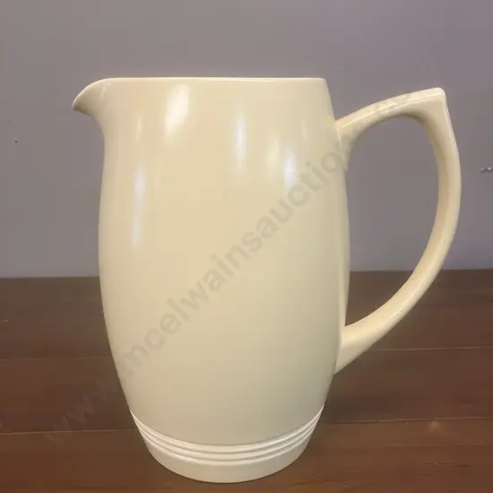 A Wedgwood Straw Yellow Large Jug Designed by Keith Murray, c1930's. H21cm