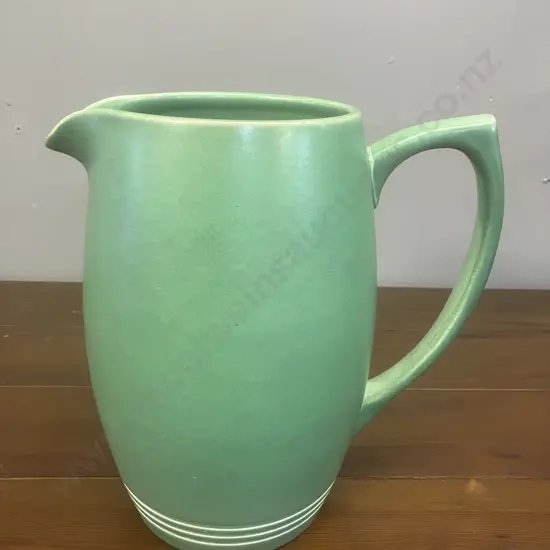 A Wedgwood Green Glazed Large Jug Designed by Keith Murray, c1930's. H21cm