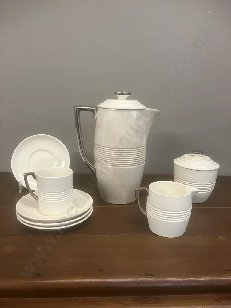 A Wedgwood 'Moonstone' Coffee Service with Silvered Handles Designed by Keith Murray - 8 Piece (Only One Cup) c1930 Image 1++