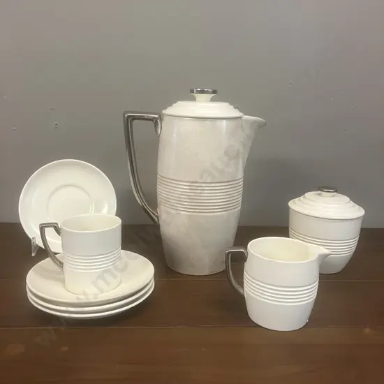 A Wedgwood 'Moonstone' Coffee Service with Silvered Handles Designed by Keith Murray - 8 Piece (Only One Cup) c1930