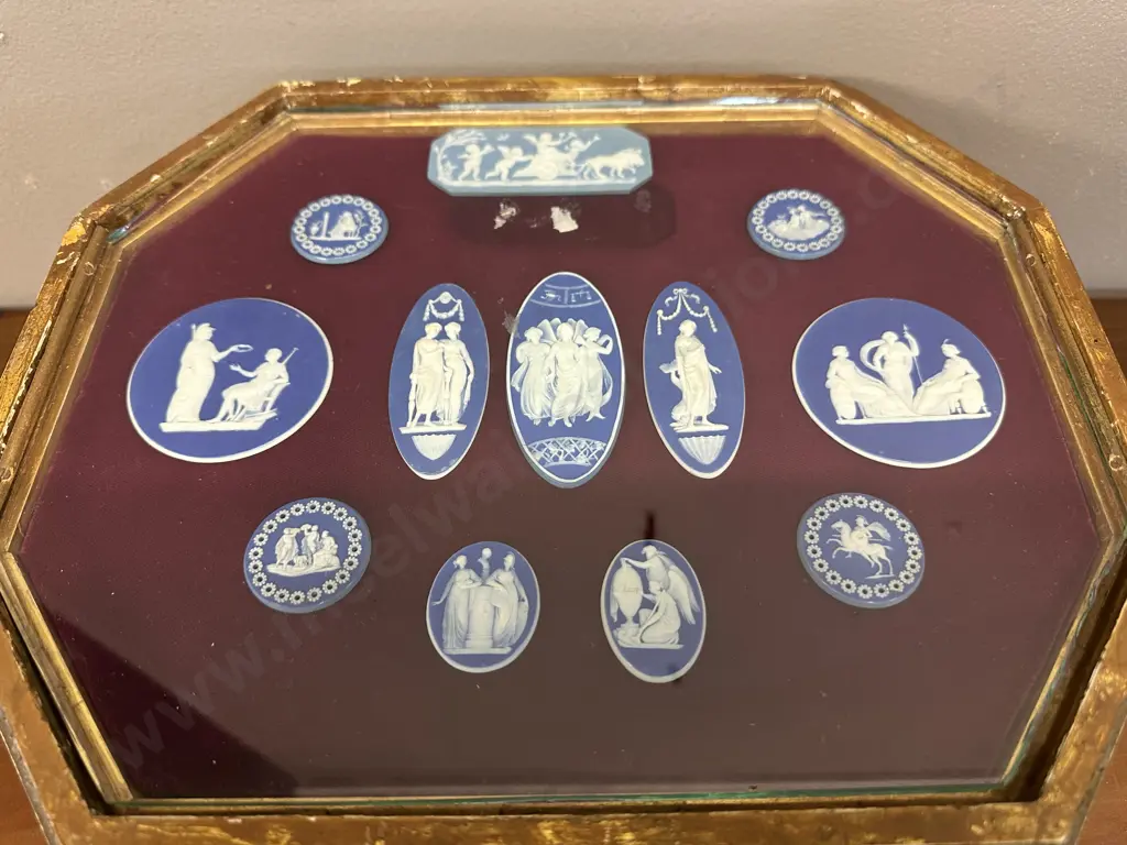 An Antique Velvet Lined Display Case, Ornate Gilt With Metal Claw Feet. 12 x Late 18th.Century Antique Wedgwood Plaques Image 1++