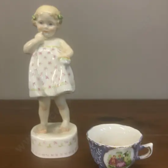 A Royal Worcester "Only Me" Porcelain Figure #3226 FC Doughty c1950's - England. H15.5cm With a Lusterware Demitasse Cup