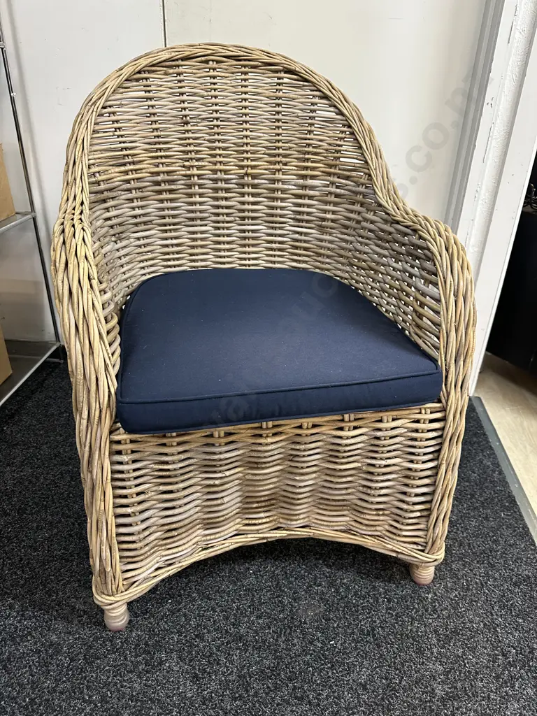 Early Settler Martinque Natural Woven Rattan Arm Chair With A Rounded Back & Navy Seat Cuchion W59cm. Image 1++