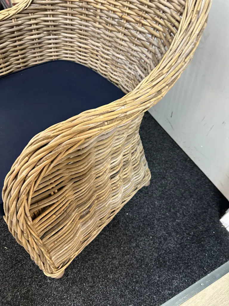 Early Settler Martinque Natural Woven Rattan Arm Chair With A Rounded Back & Navy Seat Cuchion W59cm. Image 1++