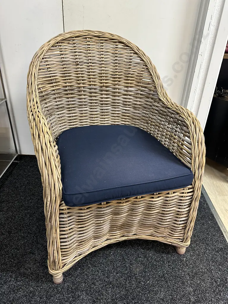Early Settler Martinque Natural Woven Rattan Arm Chair With A Rounded Back & Navy Seat Cuchion W59cm. Image 1++