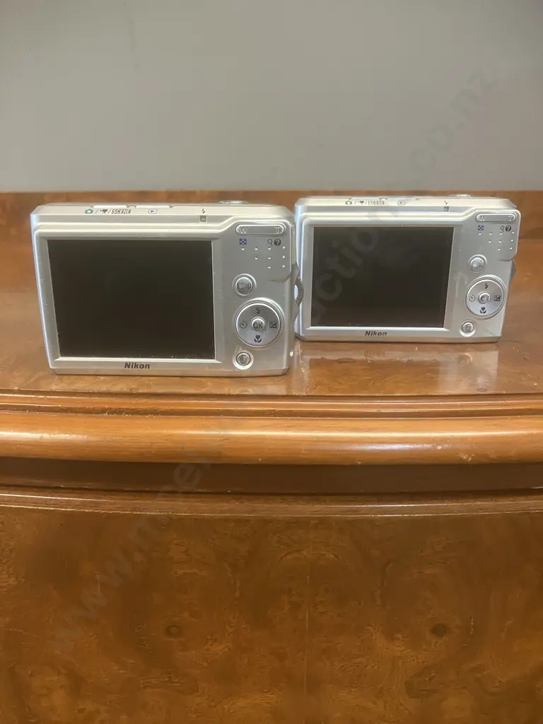 Pair of Nikon Coolpix L16 Compact Digital Camera's 7.1MP With Nikkor 3x Optical Zoom - Silver Image 1++