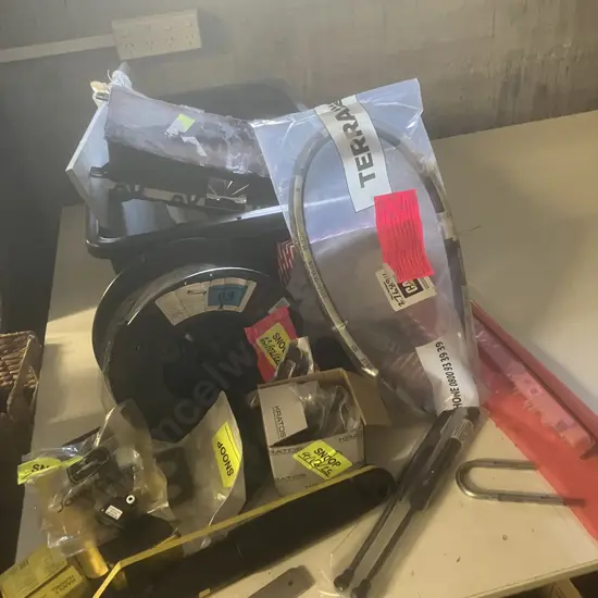 Sundry Items In Black Bin