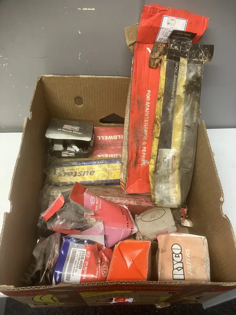 Box lot - Oil Filters, Welding Rods, Spark Plugs Image 1++