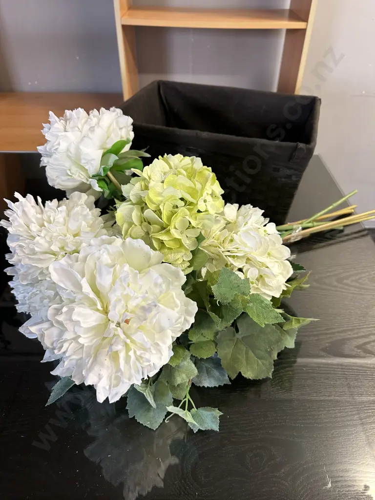 Bunch Faux Flowers In Cane Storage Basket Image 1++