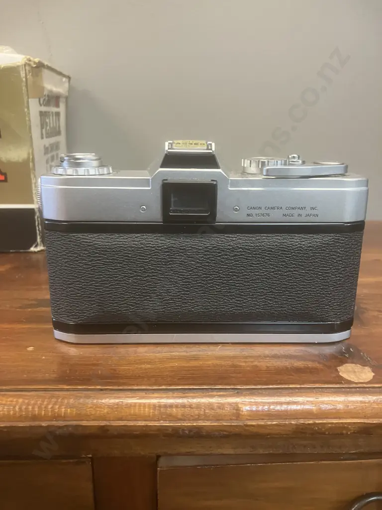Canon Pellix QL 35mm SLR Film Camera #157676 With a Canon FL 50mm f/1.4 Lens #163161, Japan 1966 Image 1++