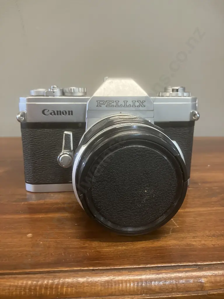 Canon Pellix 35mm SLR Film Camera #122274 & Canon FL 55mm f/1.2 Lens #14084, Japan 1965 Image 1++