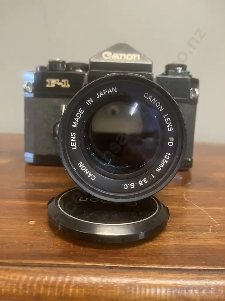 Canon F-1 35mm SLR Film Camera #253330 With a Canon FD 135mm f/3.5 S.C. Lens, Japan 1971 - 1981 Image 1++