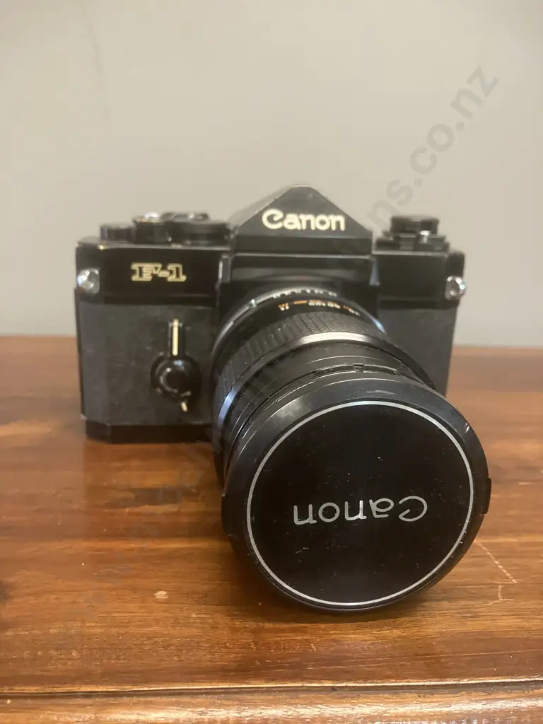 Canon F-1 35mm SLR Film Camera #253330 With a Canon FD 135mm f/3.5 S.C. Lens, Japan 1971 - 1981 Image 1++