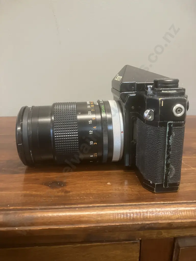 Canon F-1 35mm SLR Film Camera #253330 With a Canon FD 135mm f/3.5 S.C. Lens, Japan 1971 - 1981 Image 1++