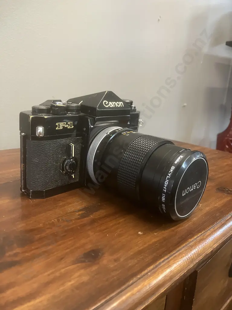 Canon F-1 35mm SLR Film Camera #253330 With a Canon FD 135mm f/3.5 S.C. Lens, Japan 1971 - 1981 Image 1++