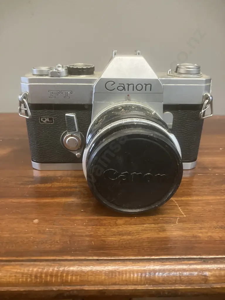 Canon FT QL 35mm SLR Film Camera #320892 With a Canon FL 50mm f/1.8 Lens #566338 (Early Version), Japan 1966 - 1972 Image 1++