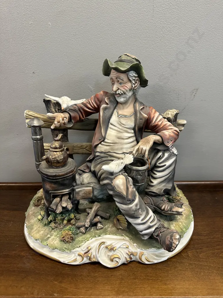 Vintage Signed Italian Capodimonte Porcelain Figurine Tramp Seated On Bench Feeding Bird H26 W31cm. Image 1++