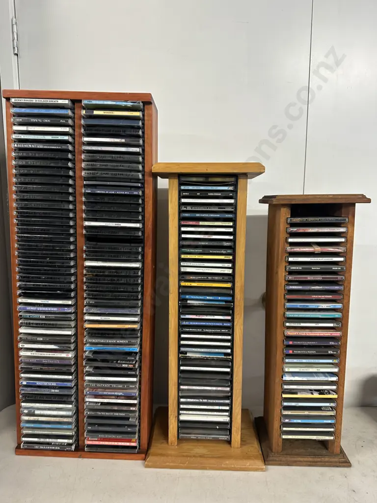 Assorted Cds And Cd Storage Racks Image 1++