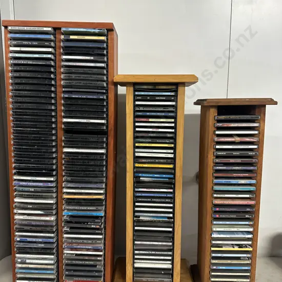 Assorted Cds And Cd Storage Racks