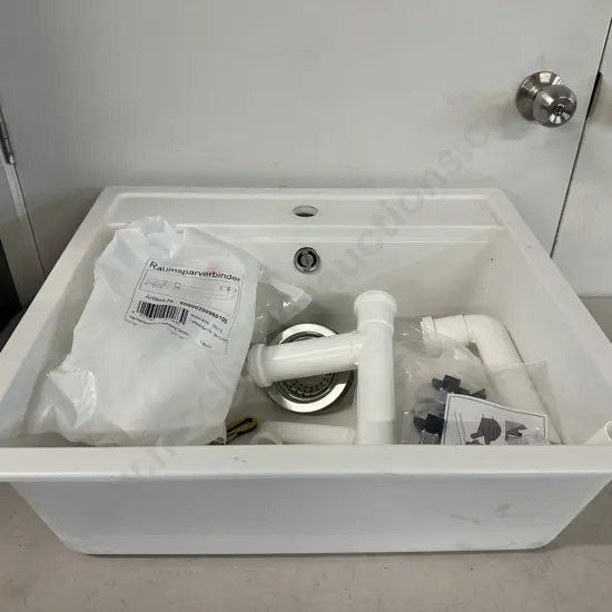 White Schock Sink With Assorted Fittings