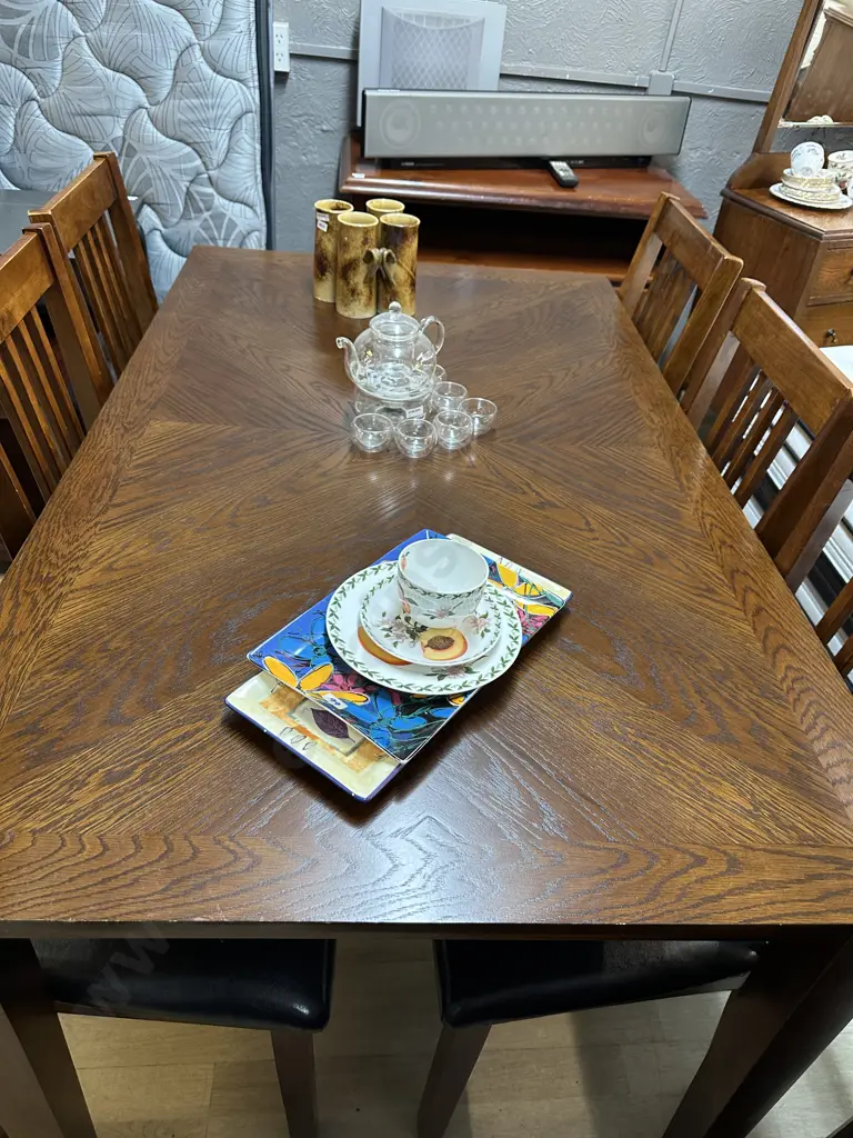 Oak Effect Rectangular Table With 6 Slat Back Dining Chairs With Black PU Leather Seats. H76 W152 D91.5cm Image 1++