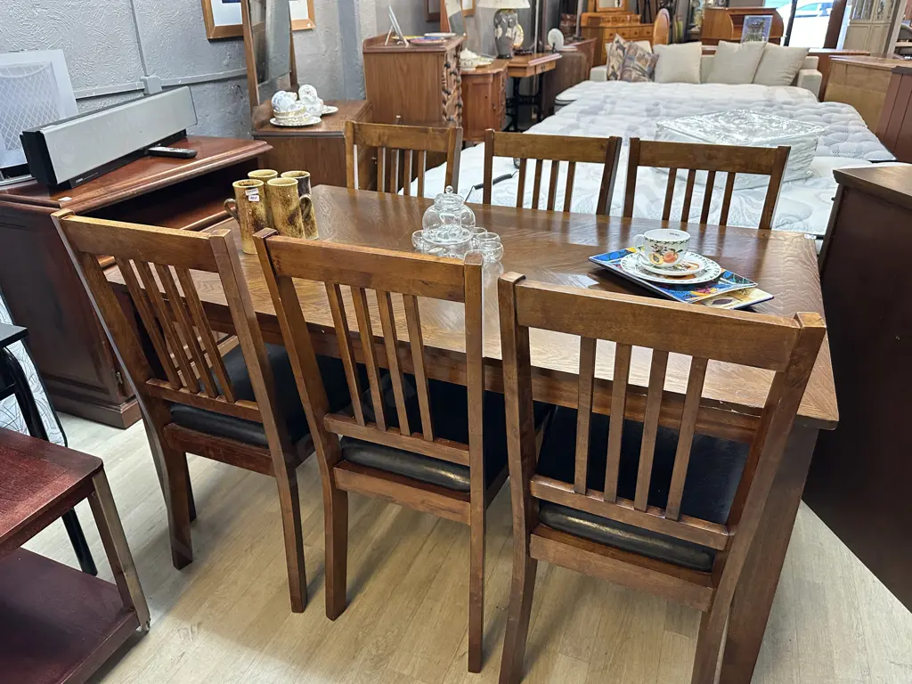 Oak Effect Rectangular Table With 6 Slat Back Dining Chairs With Black PU Leather Seats. H76 W152 D91.5cm Image 1++