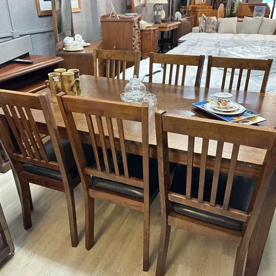 Oak Effect Rectangular Table With 6 Slat Back Dining Chairs With Black PU Leather Seats. H76 W152 D91.5cm