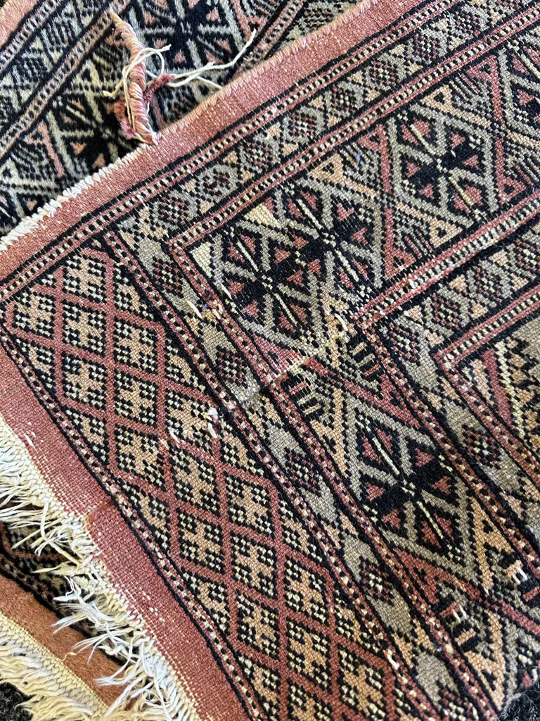Vintage Hand Knotted Floor Rug With A Distinctive Salmon Pink Background Geometric Diamond & Medallion Motifs 122x76cm.  Image 1++