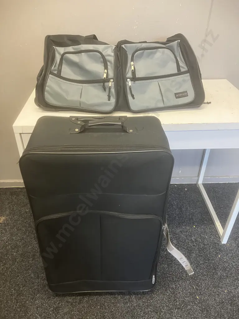 Rolling Duffell Bag & Black Suitcase Image 1++