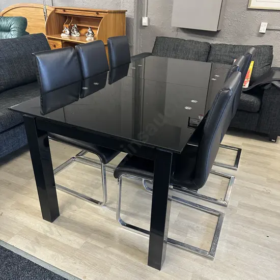 Black Glass Table With 6 Black Leather? Cantilever Base Dining Chairs