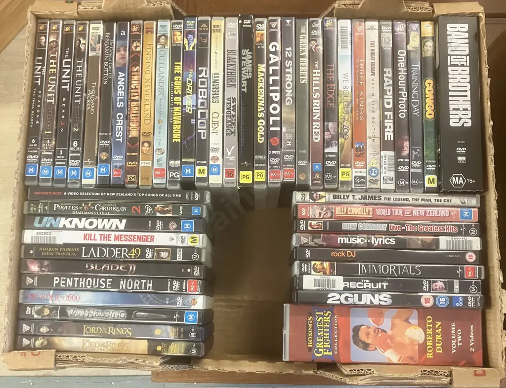 Assorted DVDs & Roberto Duran on VHS Image 1++