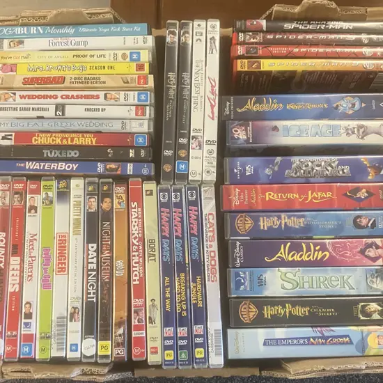 Assorted DVDs & Video Tapes