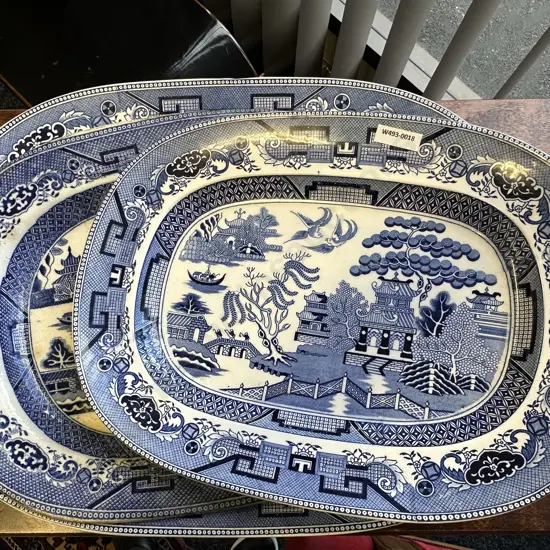 Trio of Antique Blue and White Willow Pattern Platters. Graduating Sizes 37 x 27cm,39 x 30cm,48 x 35cm