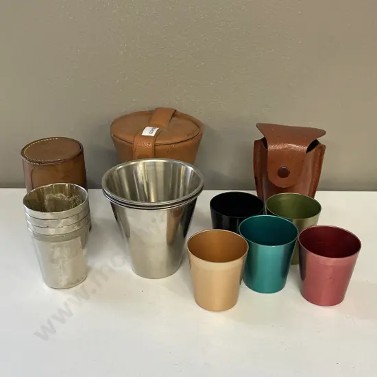 Three Vintage Anodised Travelling cup sets in leather cases