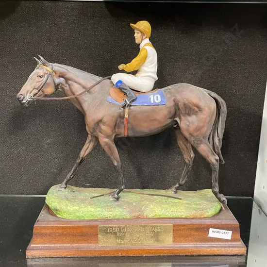 Ceramic "Winning Horse" Figurine on Wooden plinth (af). H32cm