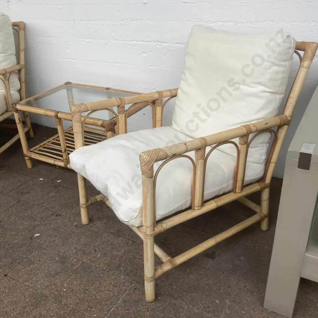 Cane Patio Suite. Two armchairs with cream fabric squabs and rectangular glass topped table - 67 x 47cm Image 1++