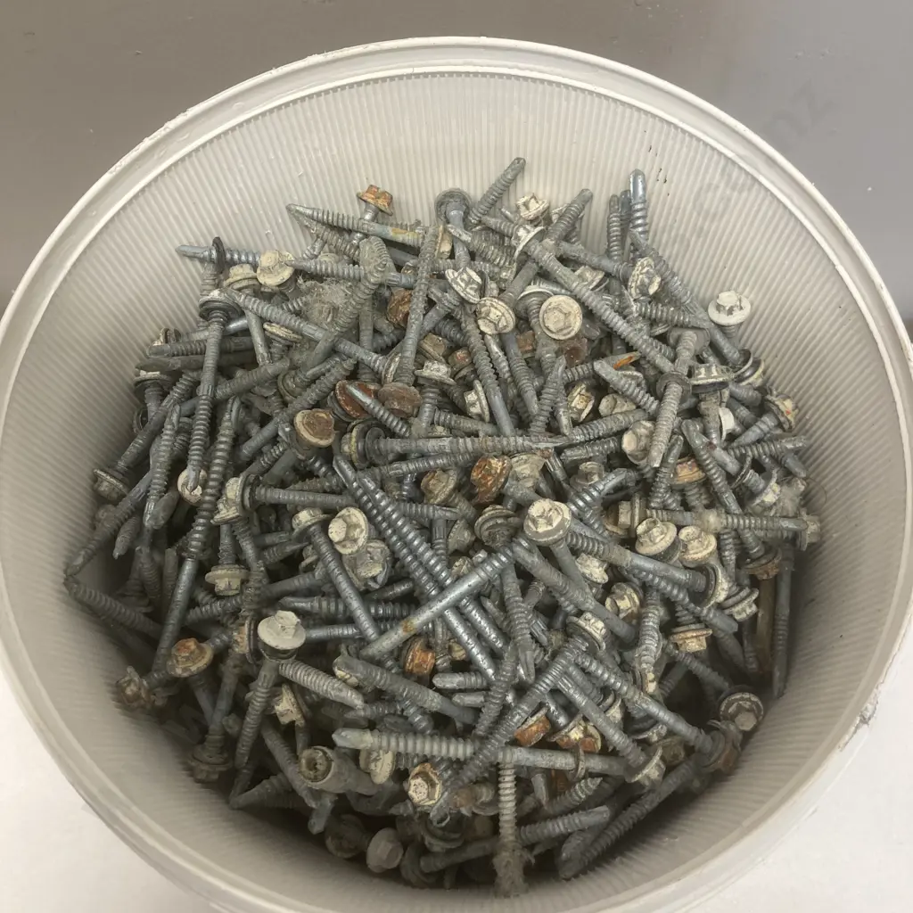 Bucket of Tek Screws Image 1++