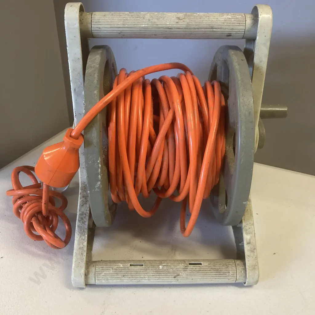 Orange Extension lead On Plastic Hose Reel Image 1++
