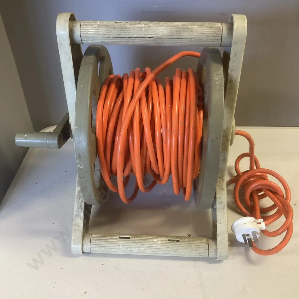 Orange Extension lead On Plastic Hose Reel Image 1++