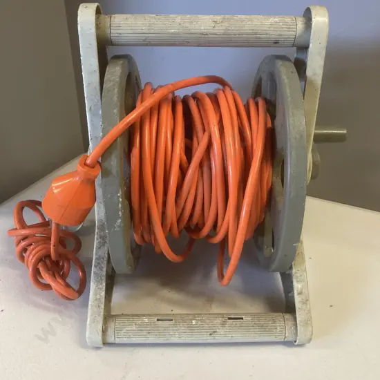 Orange Extension lead On Plastic Hose Reel